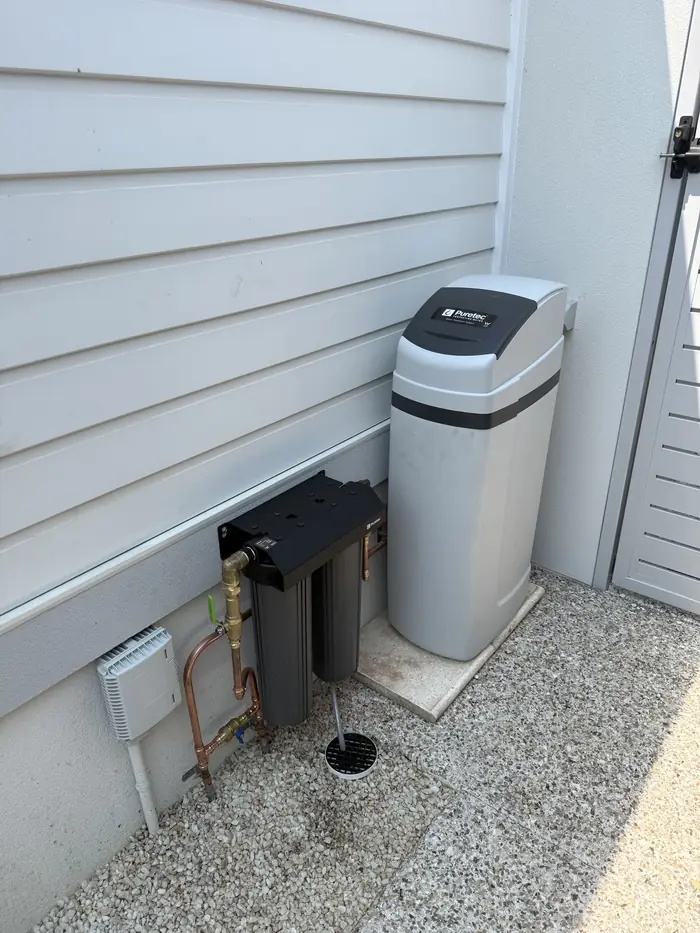 Puretec whole-property water filtration unit installed outside a Southwest WA home